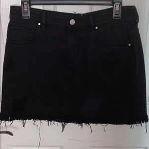 Black distressed denim mini skirt